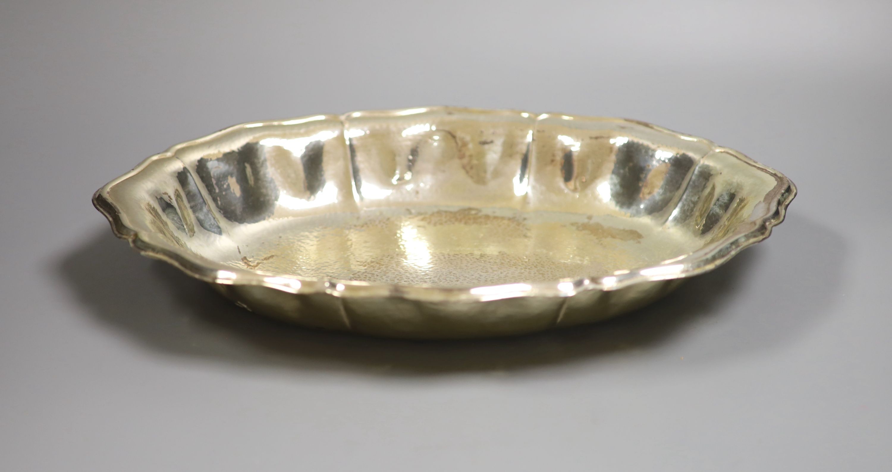 A 20th century Italian Missiaglia planished 800 standard bowl of oval form, 37.7cm, 29oz.